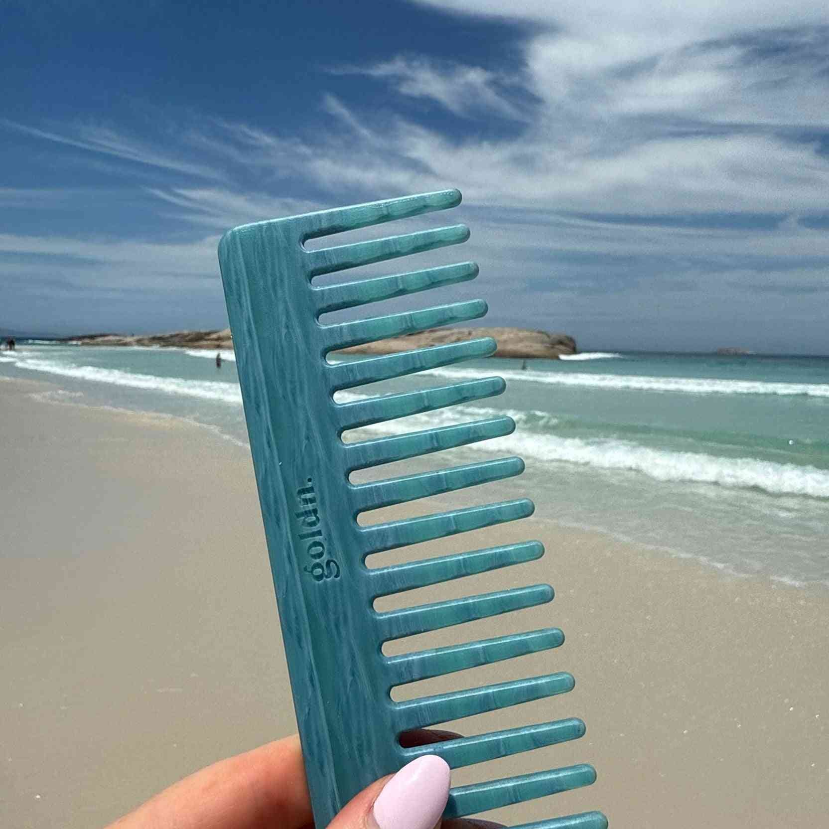 The classic og hair comb in blue tangle free and biodegradable