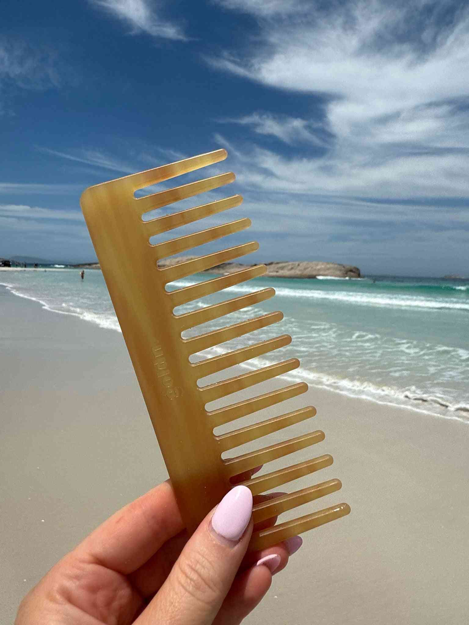 The classic og hair comb in orange tangle free and biodegradable 