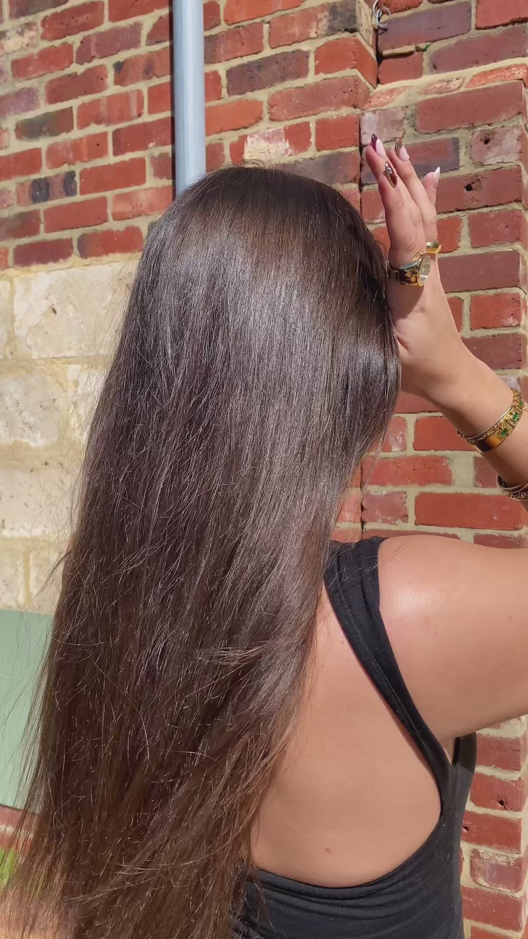 Video compilation of girls using a tortoiseshell claw clip to tie up their hair in a half up, half down or full up do.